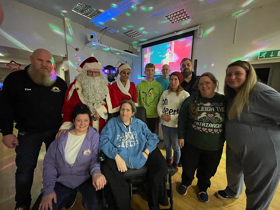 Guests together at a CelebrateAble Christmas community event